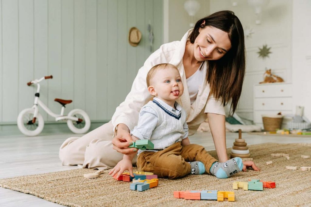 Mother and child playing with blocks together and working on prefrontal cortex development
