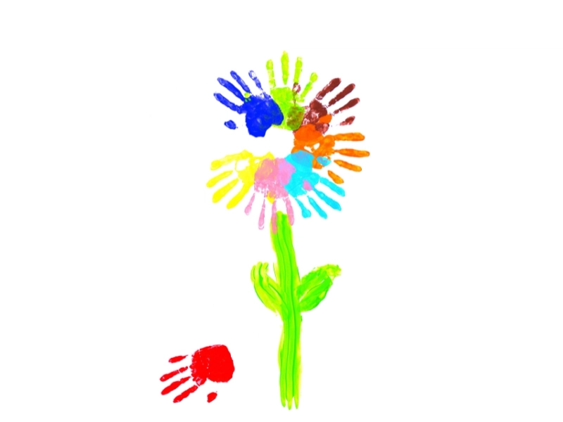 Mothers day crafts for kids - a flower made out of colorful handprints. 