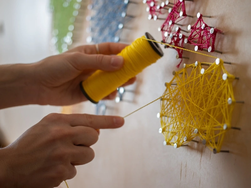 This Mothers day crafts for kids consists of a string art.