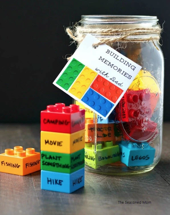 Father's Day Crafts for preschoolers includes this mason jar with contains legos with activity ideas on each lego. 