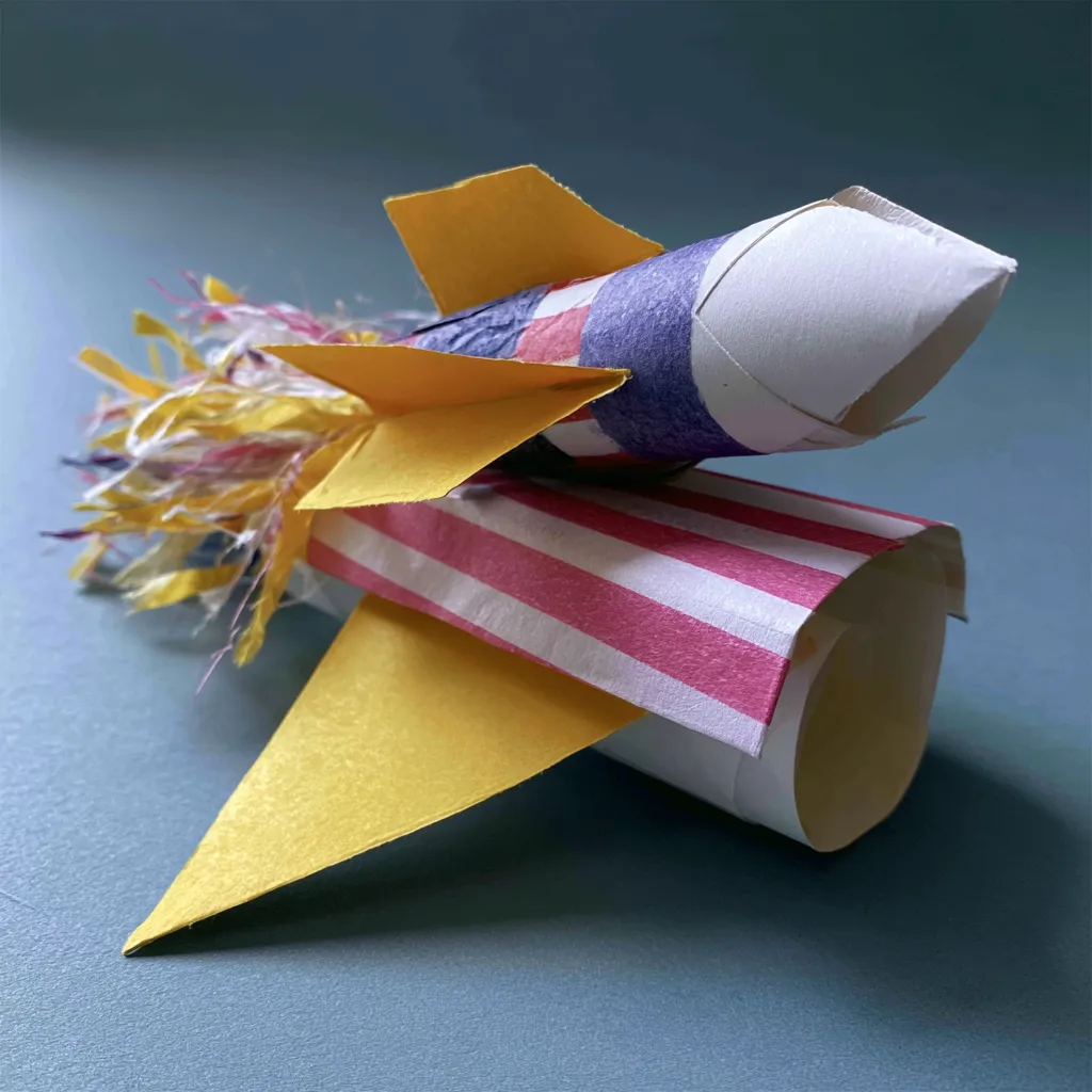 paper rockets, one of the best 4th of July crafts for preschoolers