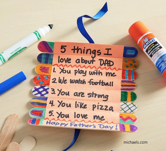 Father's Day crafts for preschoolers include 7 popsicles sticks glued together with 5 things I love about dad written on each one.