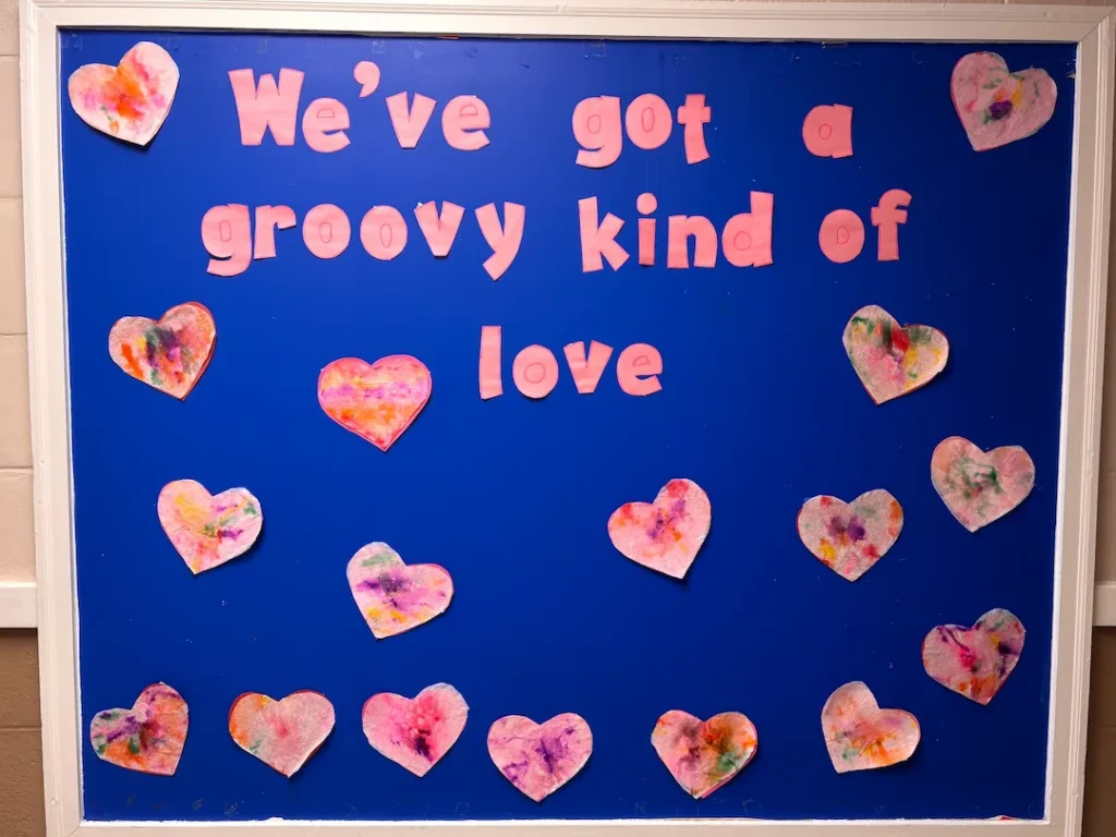 A classroom board meant to explain valentine's day to preschoolers