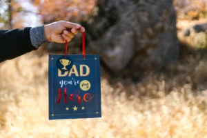 Father's Day gift ideas for preschoolers include creating a custom card and a photo album.